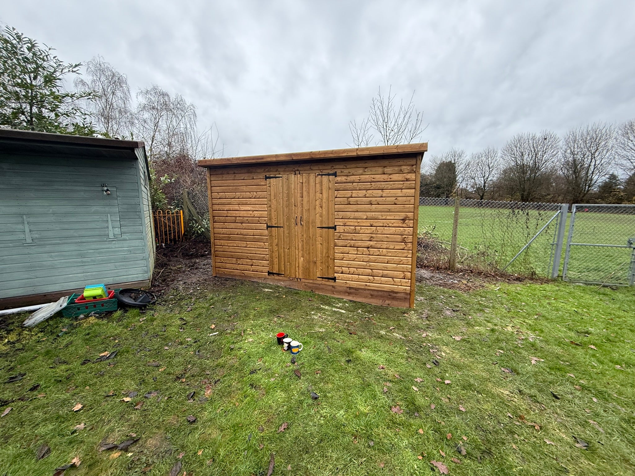 12ft x 8ft 19mm Log Roll Pent Shed Double Doors